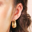 Tapered Oval Hoop Gold Earrings