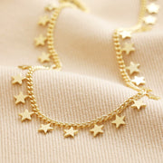 Tiny Star Charm Necklace in Gold