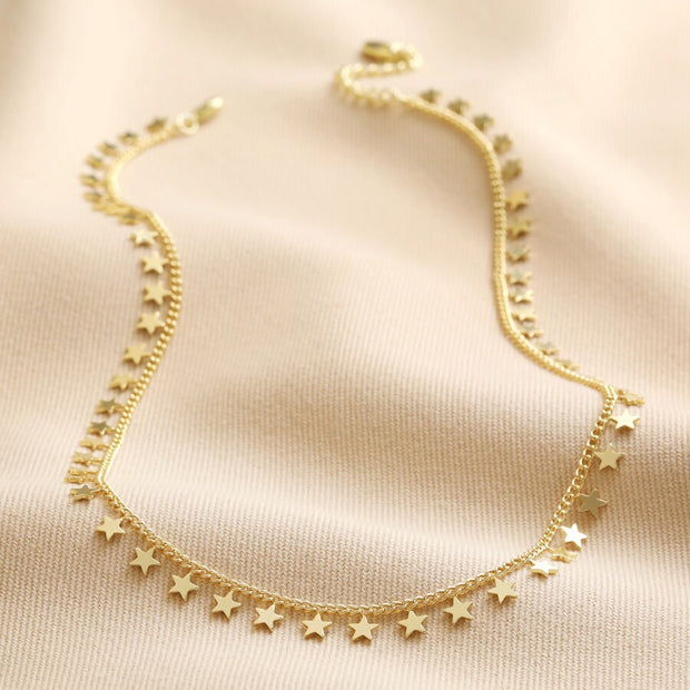 Tiny Star Charm Necklace in Gold